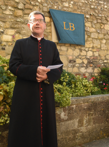 Reverend Edward Dowler speaks at the plaque unveiling.